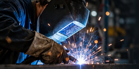 Illustrative concept image of welding sparks; not an actual workshop or facility.